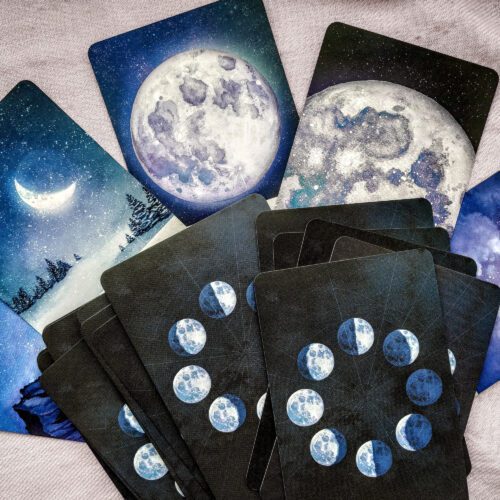 Moon cards spread on a table
